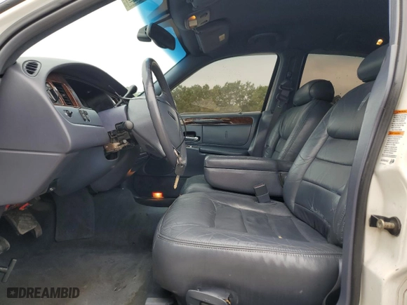 2001 Lincoln Town Car Executive with VIN 1LNHM81W91Y650775, listed as a Copart auction lot 47074385 with 141,344 mi miles and Salvage Title. Bid and sale history available at carsss.com. Image 7.