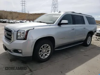 2019 GMC Yukon XL SLT with VIN 1GKS2GKC8KR371087, listed as a Copart auction lot 48576775 with 101,632 mi miles and Salvage title. Bid and sale history available at DreamBid. Image 1.