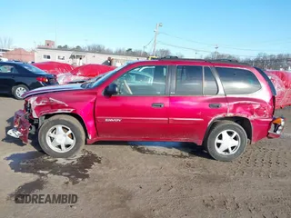 2002 GMC Envoy SLT with VIN 1GKDT13S222517064, listed as a IAAI auction lot 41590087 with 312,164 mi miles. Bid and sale history available at carsss.com. Image 14.
