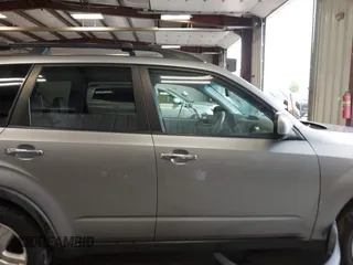 2009 Subaru Forester X with VIN JF2SH63619H731296, listed as a IAAI auction lot 42294036 with 184,739 mi miles and . Bid and sale history available at DreamBid. Image 13.