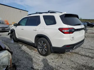 2024 Honda Pilot Touring with VIN 5FNYG1H7XRB017067, listed as a Copart auction lot 51317195 with 12,538 mi miles and Salvage Title. Bid and sale history available at carsss.com. Image 2.
