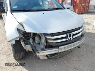 2015 Honda Odyssey EX-L with VIN 5FNRL5H61FB010289, listed as a IAAI auction lot 41887660 with 177,172 mi miles and . Bid and sale history available at carsss.com. Image 6.