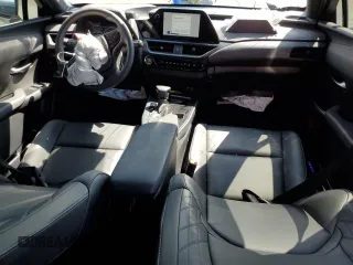 2024 Lexus UX with VIN JTHX6JBH7R2189588, listed as a Copart auction lot 70237664 with 9,963 mi miles and Salvage Title. Bid and sale history available at carsss.com. Image 8.