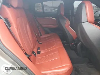 2021 BMW X4 M z VIN 5YMUJ0C03M9F20053, wystawiony jako Copart lot #87595845 z przebiegiem Nie podano mil oraz Szkody całkowita. Historia ofert i sprzedaży dostępna na DreamBid. Obrazek 11.