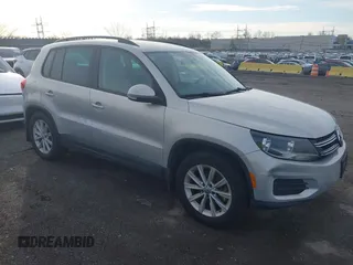 2015 Volkswagen Tiguan SE z VIN WVGBV7AX8FW506207, wystawiony jako IAAI lot #41886328 z przebiegiem 141 042 mil mil oraz . Historia ofert i sprzedaży dostępna na DreamBid. Obrazek 1.
