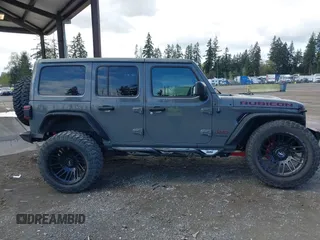 2021 Jeep Wrangler Unlimited Rubicon with VIN 1C4HJXFG9MW531858, listed as a IAAI auction lot 42001095 with 38,240 mi miles and . Bid and sale history available at DreamBid. Image 13.