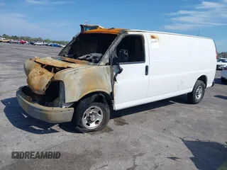 2021 Chevrolet Express Cargo with VIN 1GCWGBFP1M1267945, listed as a IAAI auction lot 38745449 with Not provided miles and . Bid and sale history available at DreamBid. Image 16.