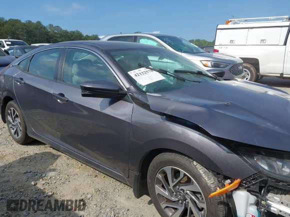 2017 Honda Civic EX z VIN 19XFC2F78HE227408, wystawiony jako IAAI lot #42122570 z przebiegiem 143 789 mil mil oraz . Historia ofert i sprzedaży dostępna na DreamBid. Obrazek 13.