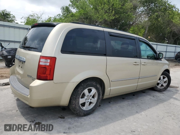 2010 Dodge Grand Caravan with VIN 2D4RN5D12AR197403, listed as a Copart auction lot 54356515 with 105,318 mi miles and Salvage Title. Bid and sale history available at DreamBid. Image 3.