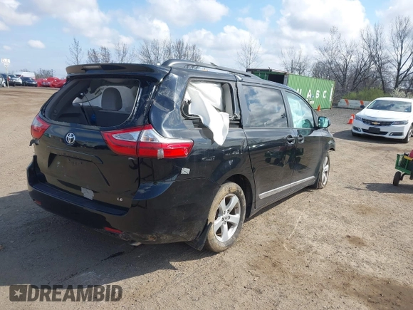 2016 Toyota Sienna LE AAS with VIN 5TDKK3DC8GS739715, listed as a IAAI auction lot 42015201 with 68,417 mi miles. Bid and sale history available at carsss.com. Image 4.