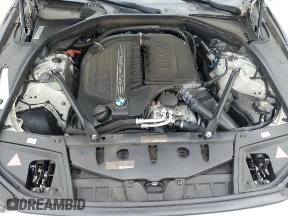 2016 BMW 5 Series 535i z VIN WBA5B1C56GG131591, wystawiony jako Copart lot #55777355 z przebiegiem 96 692 mil mil oraz Szkoda całkowita • Salvage title. Historia ofert i sprzedaży dostępna na DreamBid. Obrazek 11.