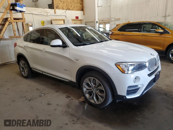 2018 BMW X4 xDrive28i with VIN 5UXXW3C5XJ0T82270, listed as a Copart auction lot 54500875 with 62,577 mi miles and Salvage title. Bid and sale history available at DreamBid. Image 4.