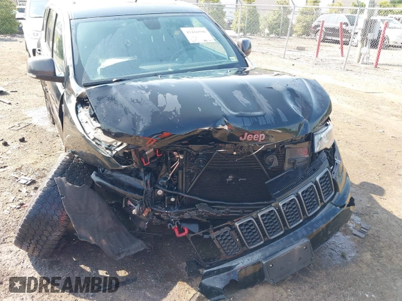 2018 Jeep Grand Cherokee Trailhawk with VIN 1C4RJFLG4JC241057, listed as a IAAI auction lot 42416590 with 81,822 mi miles and . Bid and sale history available at DreamBid. Image 6.