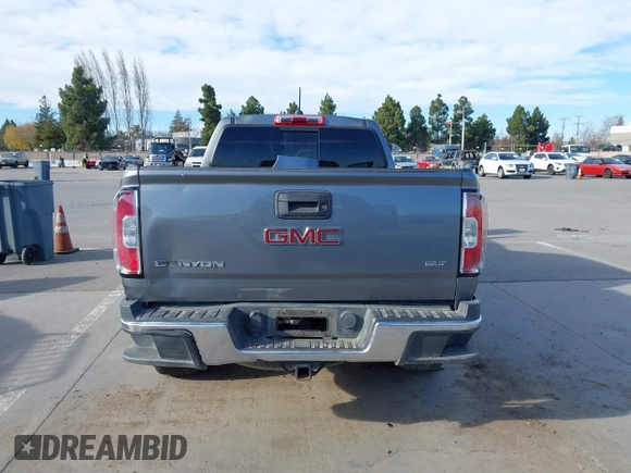 2018 GMC Canyon 4WD SLT with VIN 1GTP6DE11J1302382, listed as a IAAI auction lot 41318784 with 114,981 mi miles. Bid and sale history available at carsss.com. Image 16.