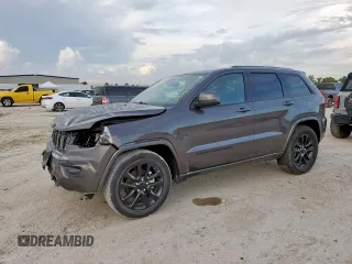 2019 Jeep Grand Cherokee Laredo E with VIN 1C4RJEAGXKC857859, listed as a Copart auction lot 62573985 with 54,237 mi miles and Salvage title. Bid and sale history available at DreamBid. Image 1.