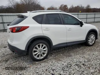2014 Mazda CX-5 Grand Touring with VIN JM3KE4DY8E0301258, listed as a Copart auction lot 84248134 with 130,599 mi miles and Clean Title. Bid and sale history available at carsss.com. Image 3.