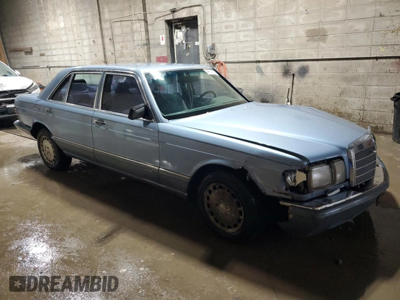 1986 Mercedes-Benz 560 with VIN WDBCA39DXGA213770, listed as a Copart auction lot 49787355 with 218,547 mi miles and Salvage Title. Bid and sale history available at DreamBid. Image 4.