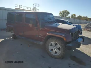 2010 Jeep Wrangler Unlimited Sahara with VIN 1J4BA5H1XAL196555, listed as a Copart auction lot 76704534 with 112,365 mi miles and Salvage Title. Bid and sale history available at carsss.com. Image 4.