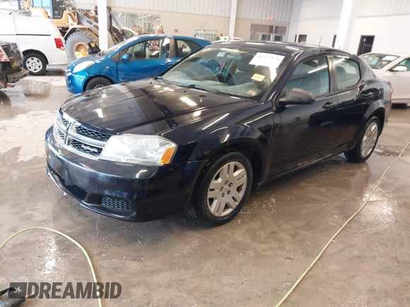 2012 Dodge Avenger SE with VIN 1C3CDZAB4CN111636, listed as a IAAI auction lot 41525179 with 202,779 mi miles. Bid and sale history available at carsss.com. Image 2.