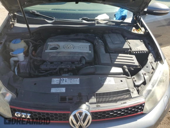 2011 Volkswagen GTI w/Sunroof & Navi PZEV z VIN WVWGD7AJ0BW330322, wystawiony jako Copart lot #54681375 z przebiegiem 139 418 mil mil oraz Szkoda całkowita • Salvage title. Historia ofert i sprzedaży dostępna na DreamBid. Obrazek 11.