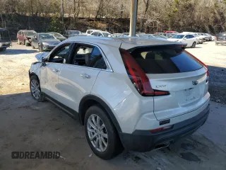 2021 Cadillac XT4 FWD Luxury с VIN 1GYAZAR47MF023407, выставлен на аукционе Copart как лот 88633325 с пробегом 77 353 миль миль и Списание • Salvage title. История ставок и продаж доступна на DreamBid. Изображение 2.