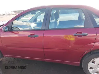 2007 Ford Focus S z VIN 1FAHP34NX7W114297, wystawiony jako IAAI lot #41774573 z przebiegiem 111 079 mil mil oraz . Historia ofert i sprzedaży dostępna na DreamBid. Obrazek 15.