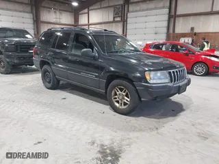 2003 Jeep Grand Cherokee Laredo with VIN 1J4GW48S63C552366, listed as a IAAI auction lot 41861501 with 227,464 mi miles. Bid and sale history available at carsss.com. Image 1.