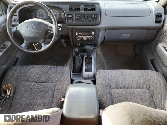 2000 Nissan Frontier XE z VIN 1N6ED27Y2YC369211, wystawiony jako Copart lot #80594884 z przebiegiem 225 194 mil mil oraz Czysty tytuł • Clean title. Historia ofert i sprzedaży dostępna na DreamBid. Obrazek 8.