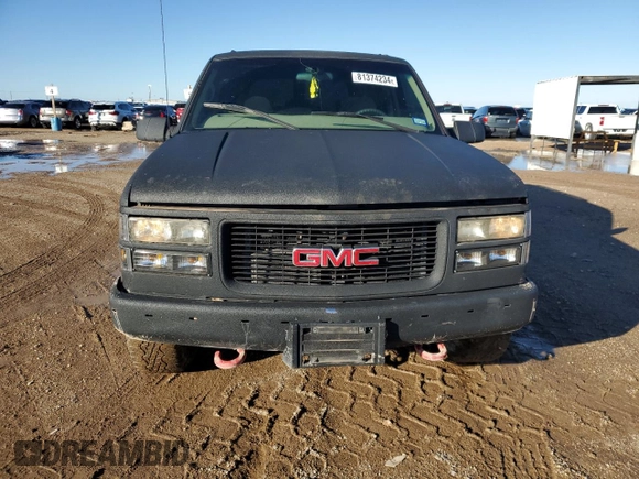 1997 GMC Yukon with VIN 1GKEK13R0VJ710179, listed as a Copart auction lot 81374234 with 186,257 mi miles and Salvage Title. Bid and sale history available at carsss.com. Image 5.