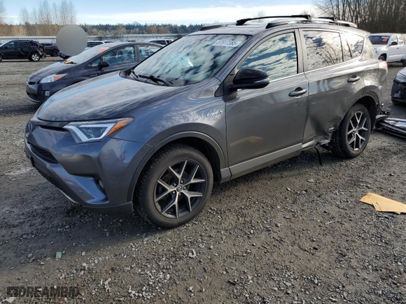 2017 Toyota RAV4 Hybrid SE with VIN JTMJJREV9HD134097, listed as a Copart auction lot 87917385 with 114,000 mi miles and Salvage Title. Bid and sale history available at carsss.com. Image 1.