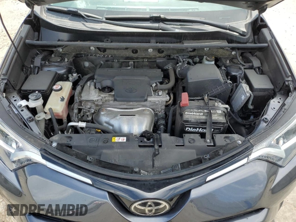 2018 Toyota RAV4 LE with VIN JTMBFREV1JJ746565, listed as a Copart auction lot 58141295 with 93,379 mi miles and Clean title. Bid and sale history available at DreamBid. Image 12.
