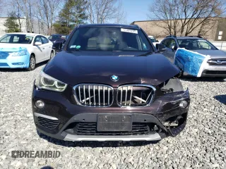 2016 BMW X1 xDrive28i z VIN WBXHT3C3XGP888701, wystawiony jako Copart lot #51409205 z przebiegiem 94 713 mil mil oraz Szkoda całkowita • Salvage title. Historia ofert i sprzedaży dostępna na DreamBid. Obrazek 5.