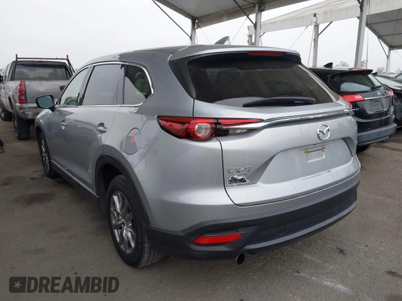 2023 Mazda CX-9 Touring с VIN JM3TCBCY6P0657078, выставлен на аукционе IAAI как лот 42125568 с пробегом 42 625 миль миль и . История ставок и продаж доступна на DreamBid. Изображение 3.