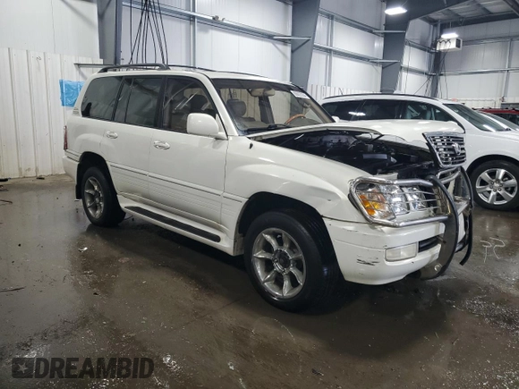 2000 Lexus LX 470 z VIN JT6HT00W9Y0109333, wystawiony jako Copart lot #47589965 z przebiegiem 261 766 mil mil oraz Szkody całkowita. Historia ofert i sprzedaży dostępna na DreamBid. Obrazek 4.