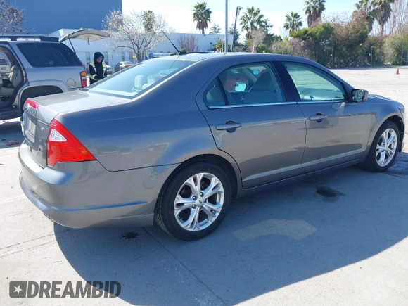 2012 Ford Fusion SE z VIN 3FAHP0HA8CR401382, wystawiony jako IAAI lot #41739680 z przebiegiem 73 404 mil mil oraz . Historia ofert i sprzedaży dostępna na DreamBid. Obrazek 4.
