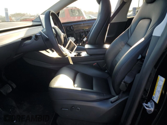 2023 Tesla Model Y Long Range with VIN 7SAYGDEEXPA078937, listed as a Copart auction lot 47095285 with 28,521 mi miles and Salvage Title. Bid and sale history available at DreamBid. Image 7.
