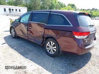 2014 Honda Odyssey EX-L z VIN 5FNRL5H64EB076088, wystawiony jako IAAI lot #42144781 z przebiegiem 174 135 mil mil oraz . Historia ofert i sprzedaży dostępna na DreamBid. Obrazek 3.