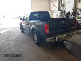 2013 Nissan Frontier SV with VIN 1N6AD0CW3DN713859, listed as a IAAI auction lot 42562240 with 127,403 mi miles and . Bid and sale history available at DreamBid. Image 3.