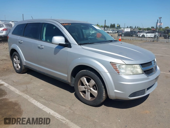 2009 Dodge Journey SXT with VIN 3D4GG57V19T211770, listed as a IAAI auction lot 42095045 with 164,610 mi miles. Bid and sale history available at carsss.com. Image 1.