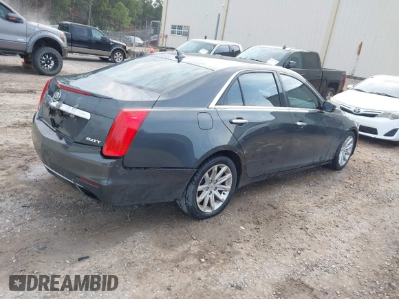 2014 Cadillac CTS Sedan RWD with VIN 1G6AP5SX8E0191104, listed as a IAAI auction lot 41605919 with 137,837 mi miles. Bid and sale history available at carsss.com. Image 4.