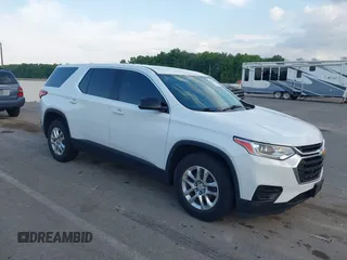 2018 Chevrolet Traverse LS z VIN 1GNEVFKW3JJ148531, wystawiony jako IAAI lot #42165009 z przebiegiem 98 585 mil mil oraz . Historia ofert i sprzedaży dostępna na DreamBid. Obrazek 1.