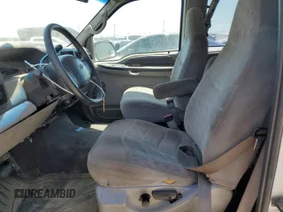 1999 Ford F-250 XL with VIN 1FTNX20L8XEB01923, listed as a Copart auction lot 65404495 with 383,297 mi miles and Salvage title. Bid and sale history available at DreamBid. Image 7.