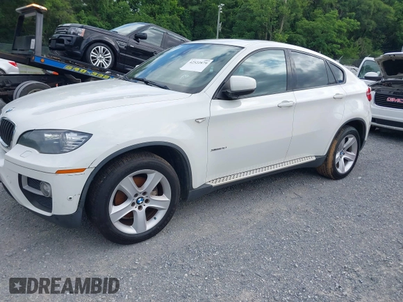 2013 BMW X6 xDrive35i z VIN 5UXFG2C59DL788319, wystawiony jako IAAI lot #42522879 z przebiegiem 158 589 mil mil oraz . Historia ofert i sprzedaży dostępna na DreamBid. Obrazek 17.