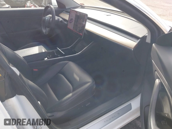 2019 Tesla Model 3 Long Range with VIN 5YJ3E1EB7KF442390, listed as a IAAI auction lot 41700122 with 65,539 mi miles. Bid and sale history available at carsss.com. Image 5.