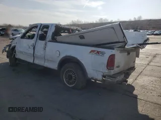 2002 Ford F-150 XL with VIN 1FTRX18L12NA01509, listed as a Copart auction lot 51098435 with Not provided miles and Salvage title. Bid and sale history available at DreamBid. Image 2.