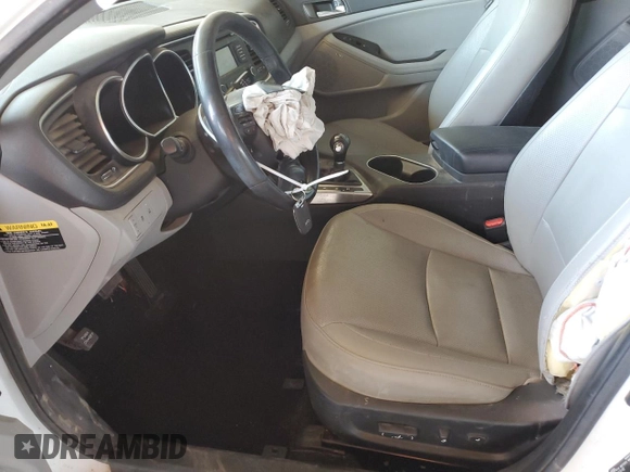 2014 Kia Optima EX z VIN 5XXGN4A71EG275210, wystawiony jako Copart lot #58095515 z przebiegiem 113 030 mil mil oraz Szkoda całkowita • Salvage title. Historia ofert i sprzedaży dostępna na DreamBid. Obrazek 7.