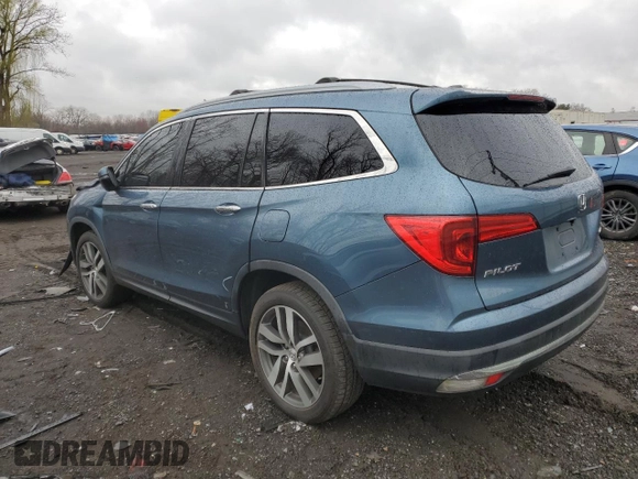 2016 Honda Pilot Touring with VIN 5FNYF6H91GB022219, listed as a Copart auction lot 52796985 with 142,014 mi miles and Salvage Title. Bid and sale history available at carsss.com. Image 2.