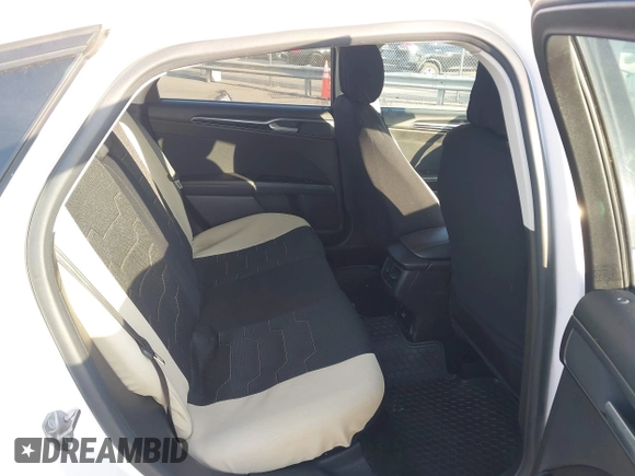 2015 Ford Fusion SE Hybrid with VIN 3FA6P0LU2FR305597, listed as a IAAI auction lot 42168292 with 97,688 mi miles and . Bid and sale history available at DreamBid. Image 8.