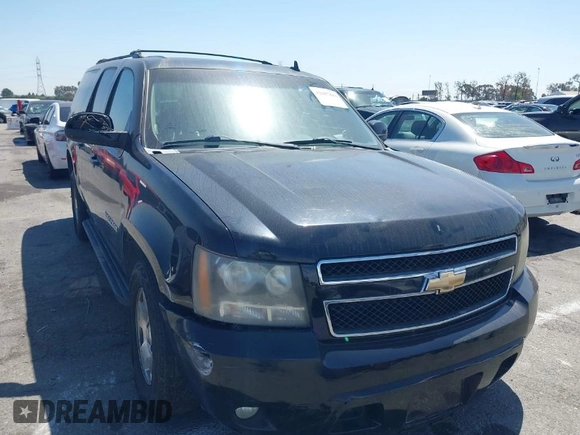 2011 Chevrolet Suburban LT with VIN 1GNSCJE0XBR285973, listed as a IAAI auction lot 42007844 with 252,994 mi miles. Bid and sale history available at carsss.com. Image 1.