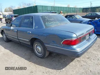 1996 Mercury Grand Marquis GS with VIN 2MELM74W8TX697141, listed as a IAAI auction lot 42082750 with 138,963 mi miles and . Bid and sale history available at DreamBid. Image 3.